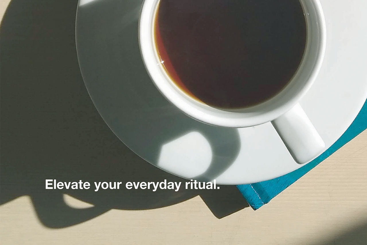 Coffee art print with quote elevate your everyday ritual in elegant typography close-up